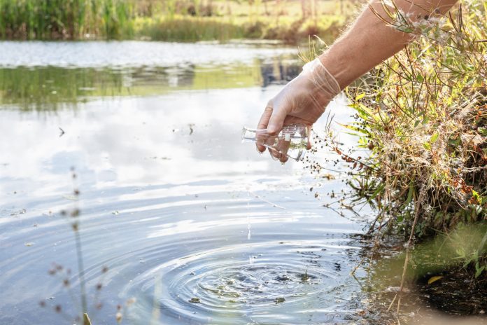 Water sample and purity analysis test, liquid in laboratory glassware