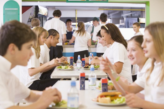 High School Students Eating In The Cafeteria