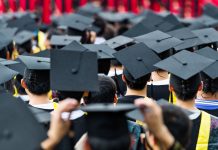 Back view of graduates during commencement.