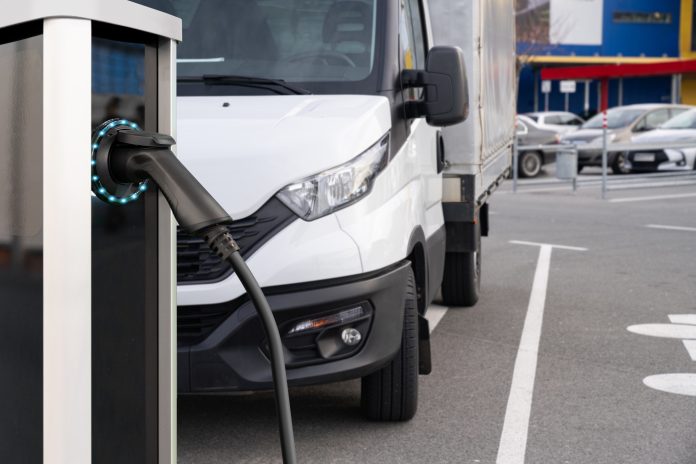 Electric truck with charging station. Concept. Electric truck with charging station. Concept.