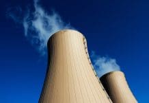 UK & US nuclear experts sign landmark HALEU partnership Cooling towers of nuclear power plant against the blue sky