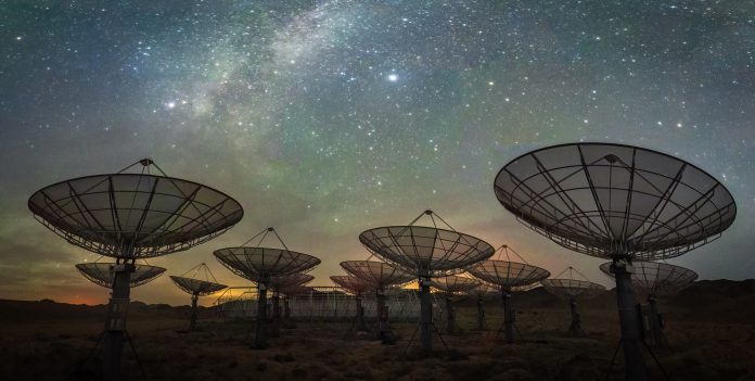 Satellite antenna array under the Milky Way sky