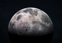 Space view of the moon's cratered surface with a star-filled outer space background. Deep space exploration and astronomy concept. Moon with detailed craters and surface