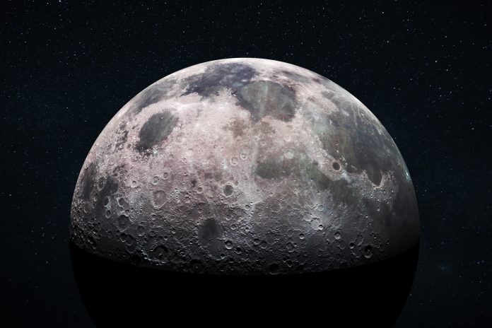 Space view of the moon's cratered surface with a star-filled outer space background. Deep space exploration and astronomy concept. Moon with detailed craters and surface